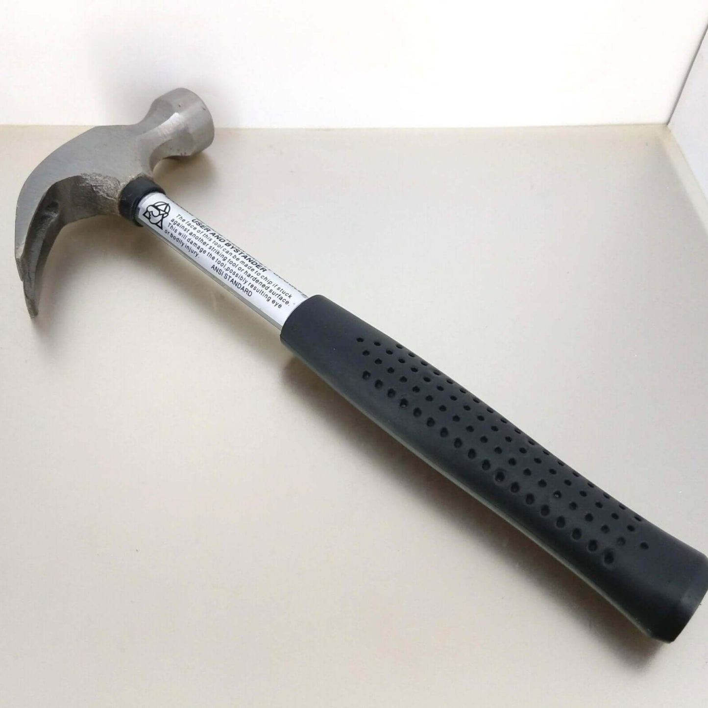 Close up of the forged steel head on the 340g mini hammer