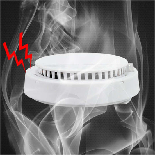 Illustrative image of a smoke alarm detecting smoke with a red lightning bolt symbol indicating an alert.