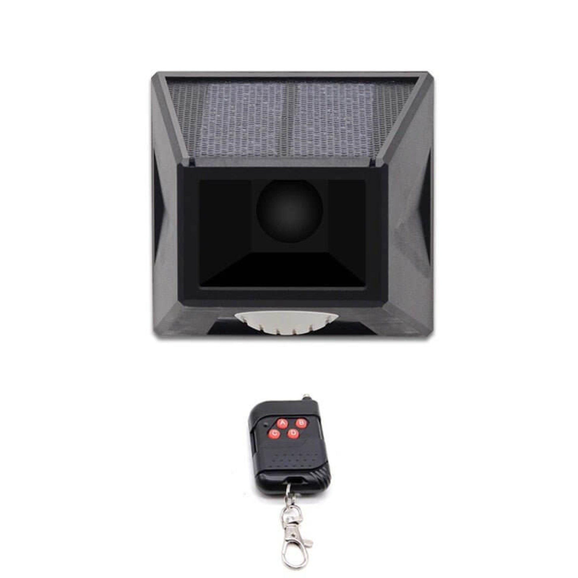 Close-up front view of the black solar motion sensor alarm light with solar panel on top and remote below.