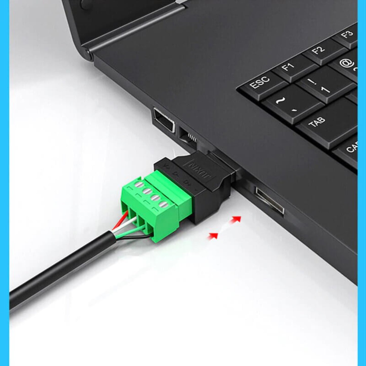 USB to 4-pin screw connector plugged into a laptop with colorful wire terminals.