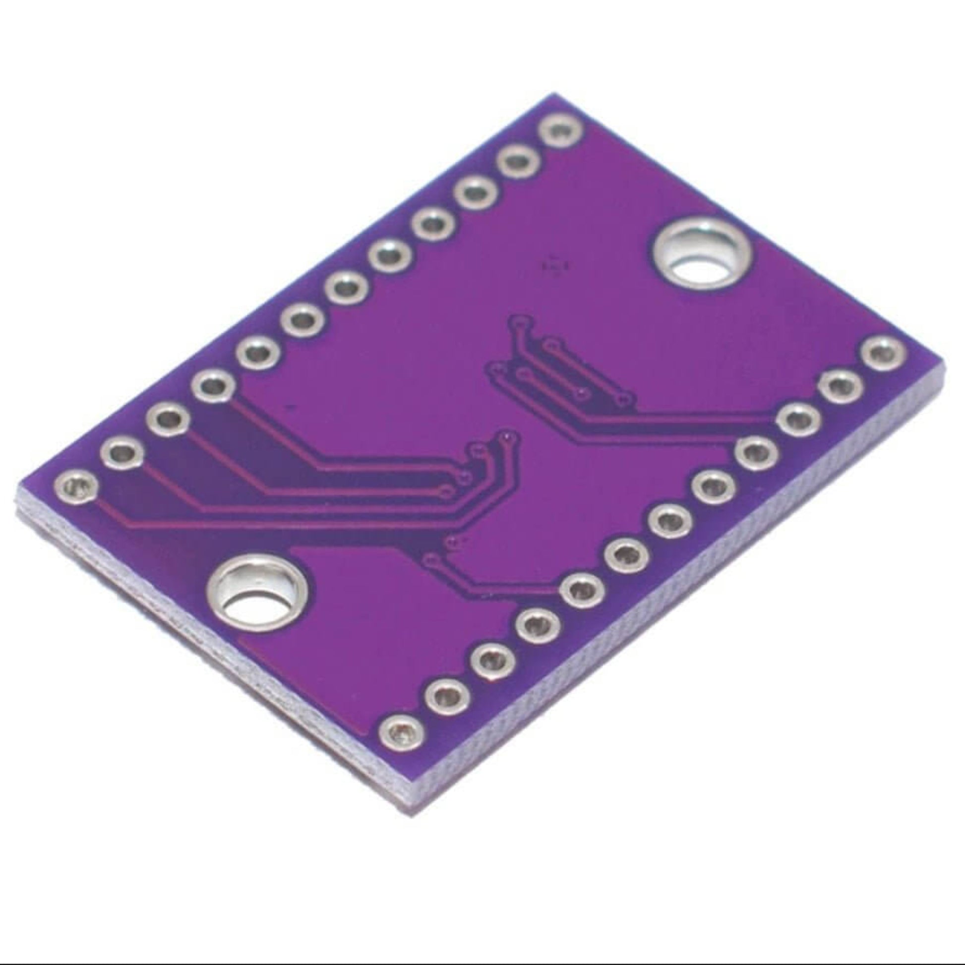 Close-up of the purple PCB back side of the TCA9548A I2C multiplexer module, showing solder pads.