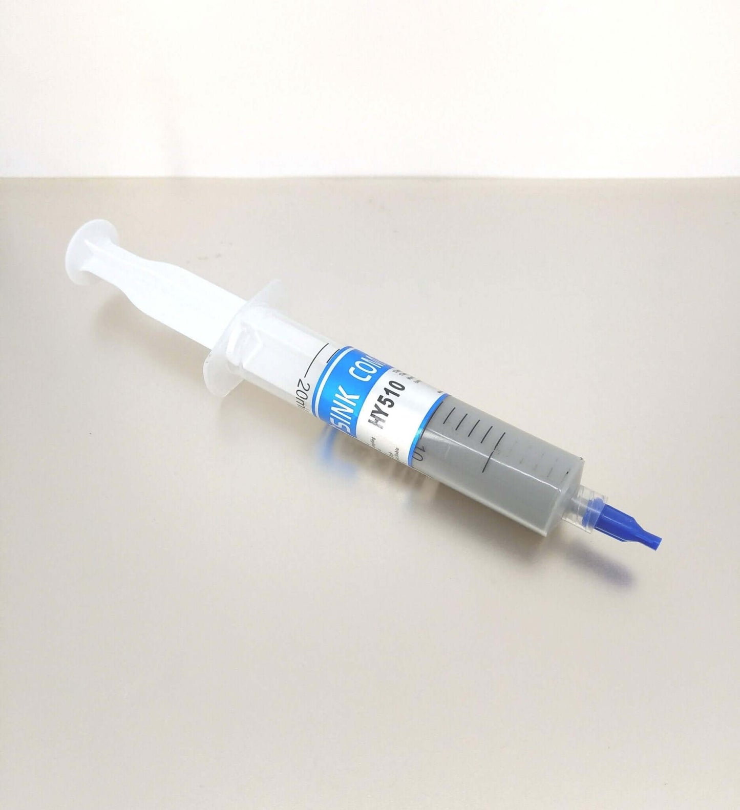 HY510 high-performance thermal paste syringe for PC cooling, 30g, designed for optimal heat transfer.