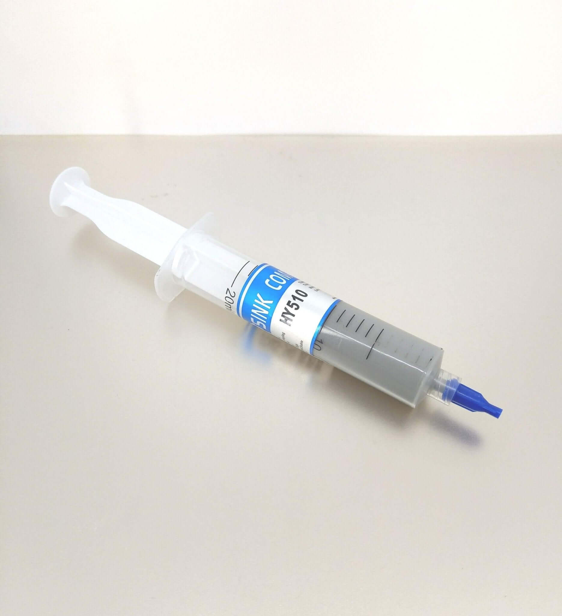 HY510 high-performance thermal paste syringe for PC cooling, 30g, designed for optimal heat transfer.