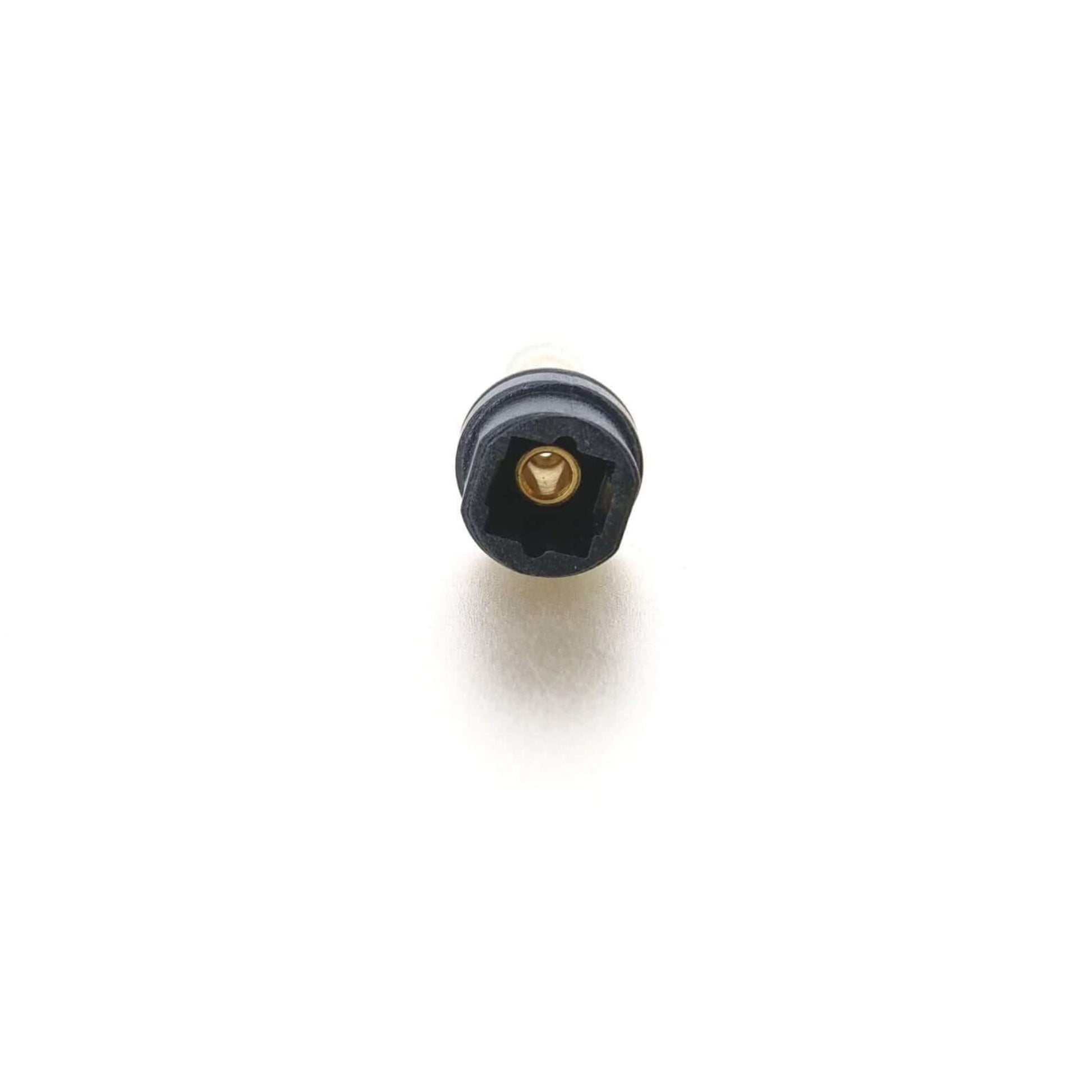 Close-up view of the toslink female port on the digital fiber optic audio adapter.