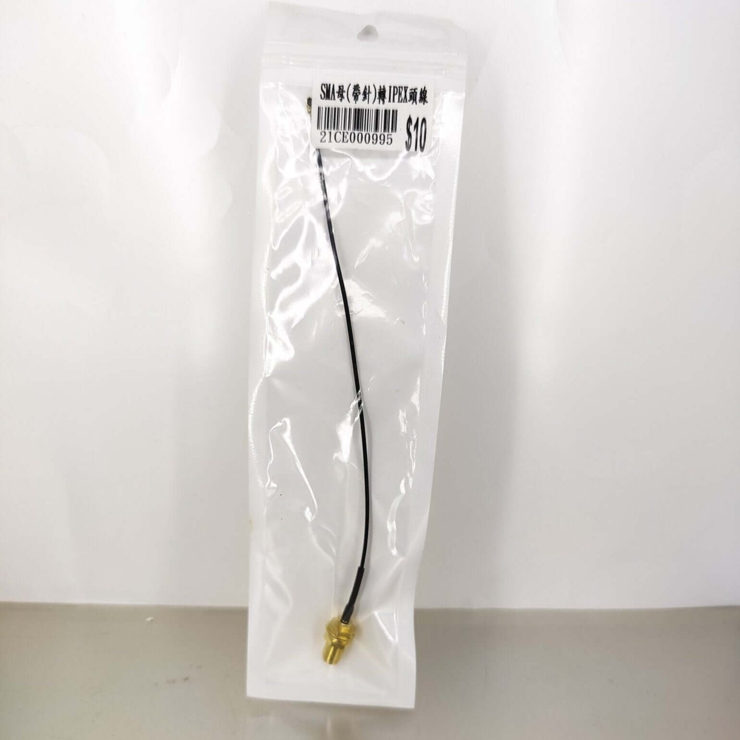 RP-SMA Female Male Pin to IPEX Cable in package, 20CM length, suitable for PCI WiFi card and router connections.